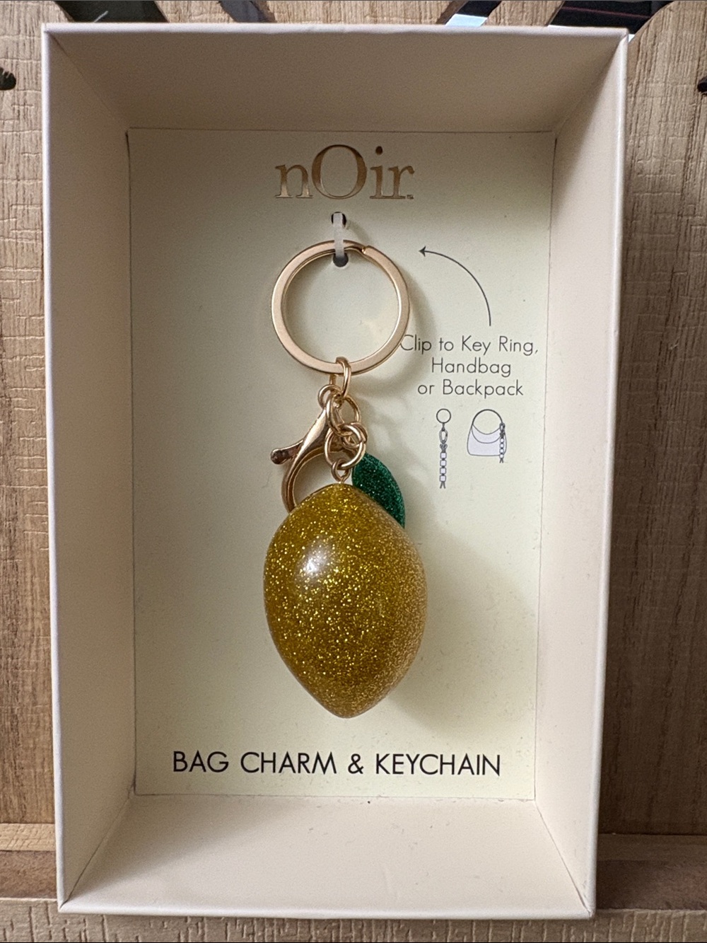 nOir Jewelry Gold Glitter Lemon Bag Charm with Green Leaf